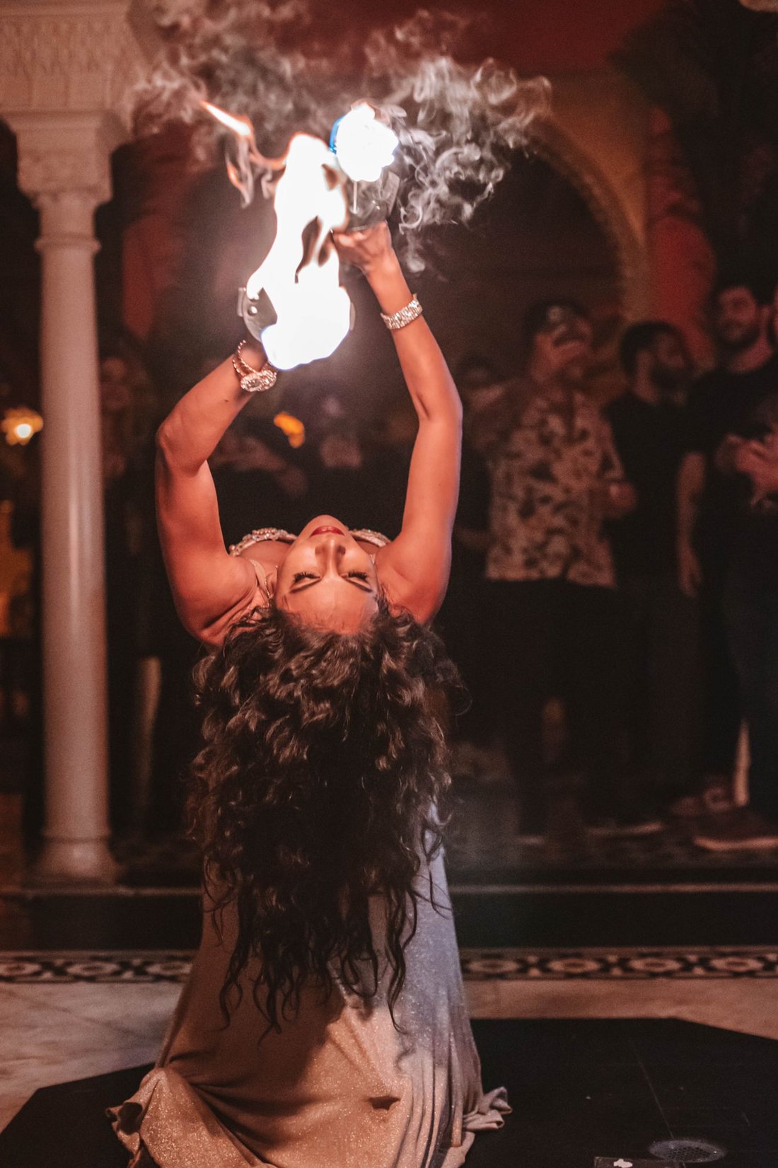 Erika performing a fire show for an audience